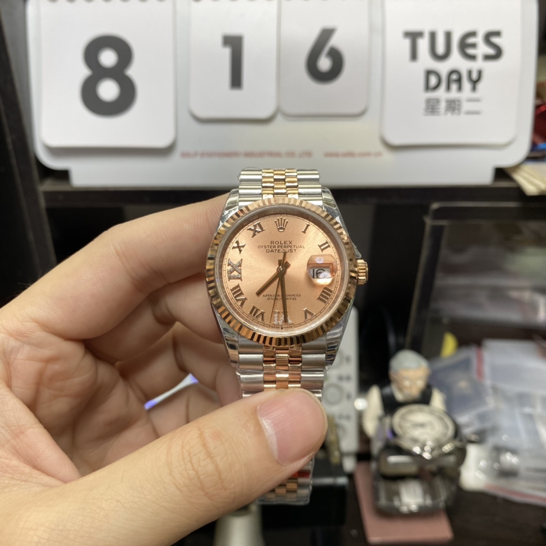 Rolex Datejust Series m126231-0027, Rose Red Dial Everose Gold Case Roman Numerals Five-Piece Link Jubilee Bracelet, 36mm Size.