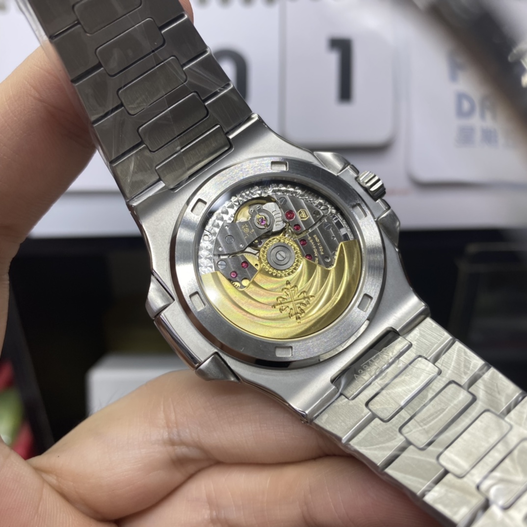 Patek Philippe Nautilus series 58111G-001, White Case with Blue Dial, 40mm Size.