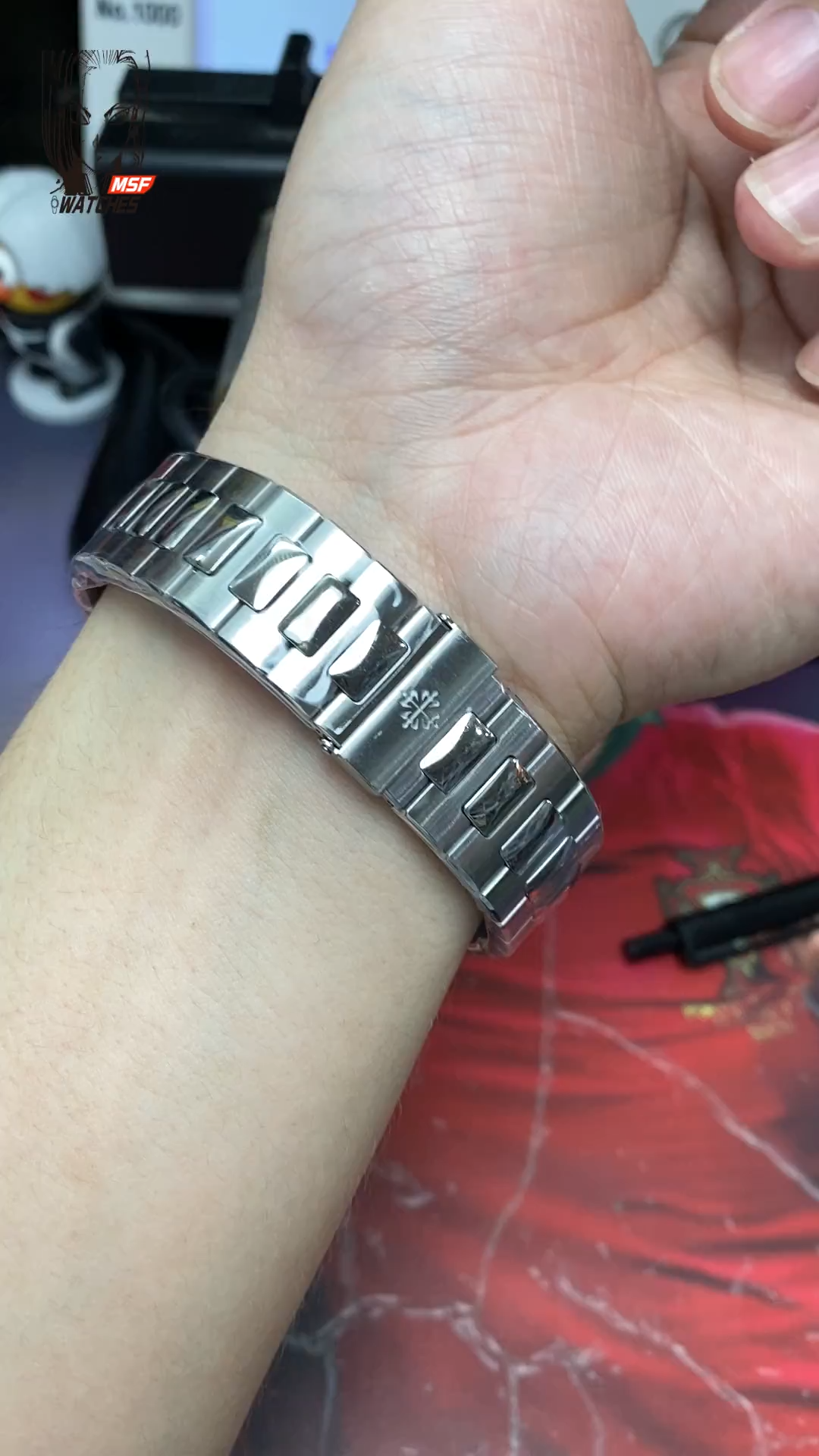 Patek Philippe Nautilus series 57111300A-001, Olive Green Dial with Square Diamond Bezel, 40mm Size.