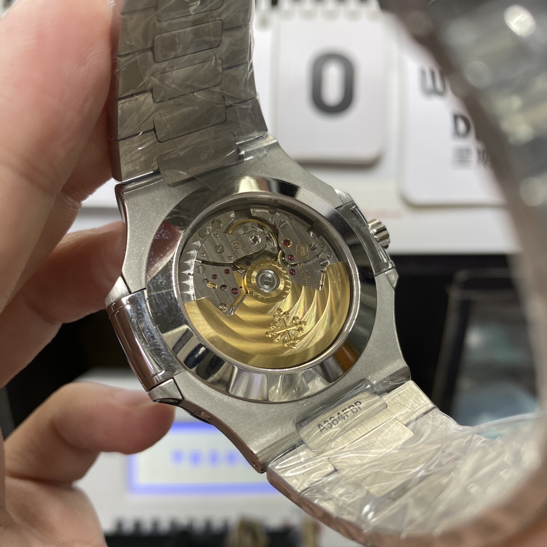 Patek Philippe Nautilus series 57261A-010, White Dial, Complete Month Day Date and Moon Phase Functions, 40.5mm Size.