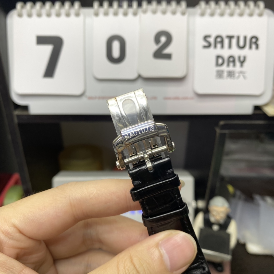 Patek Philippe Nautilus series 57111A 010, Blue Dial Silver Case and Alligator Leather Strap, 40mm Size.