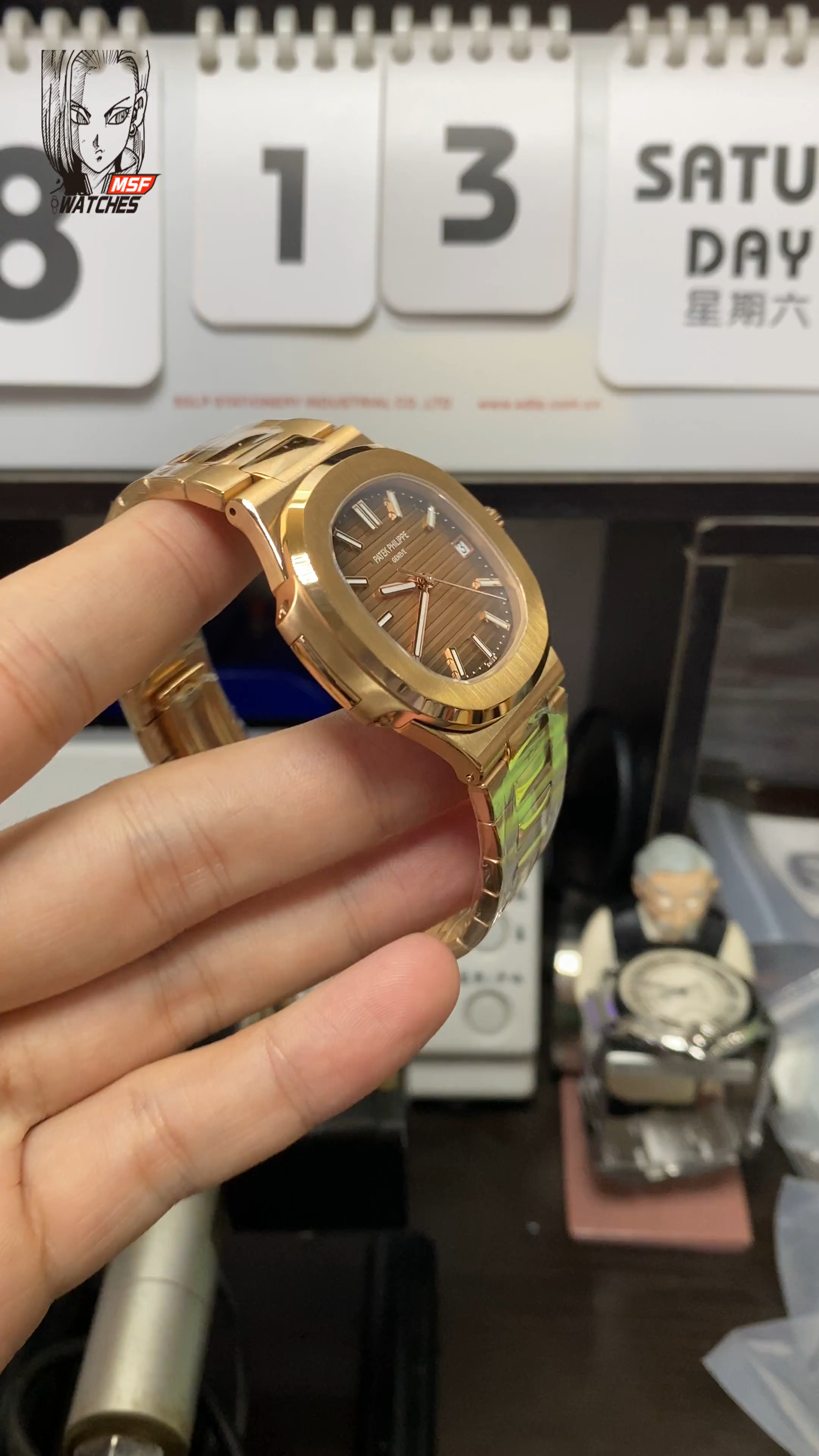 Patek Philippe Nautilus series 57111R-001, Rose Gold Case with Gradient Dark Brown Dial Steel Bracelet, 40mm Size.