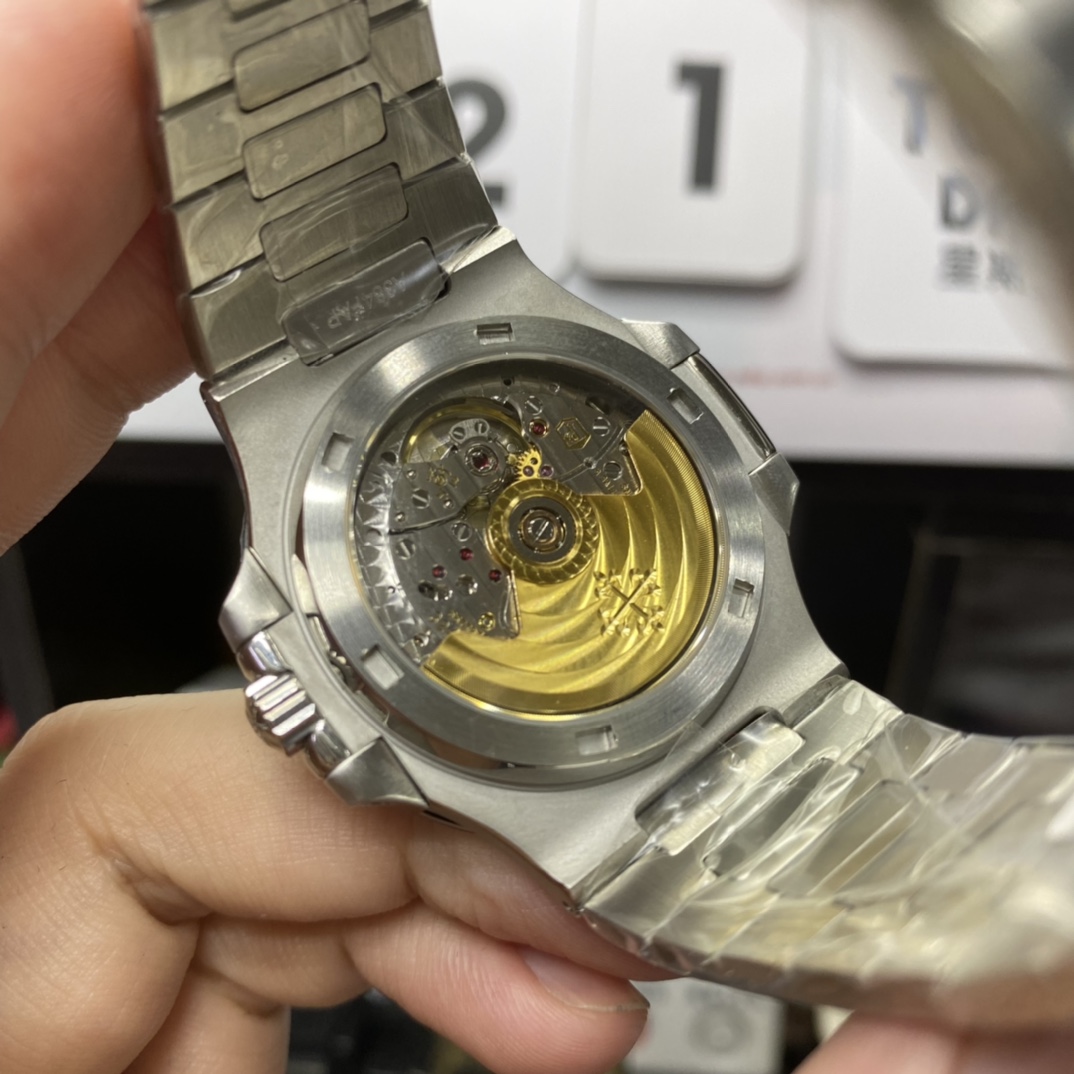 Patek Philippe Nautilus series 58111G-001, White Case with Blue Dial, 40mm Size.