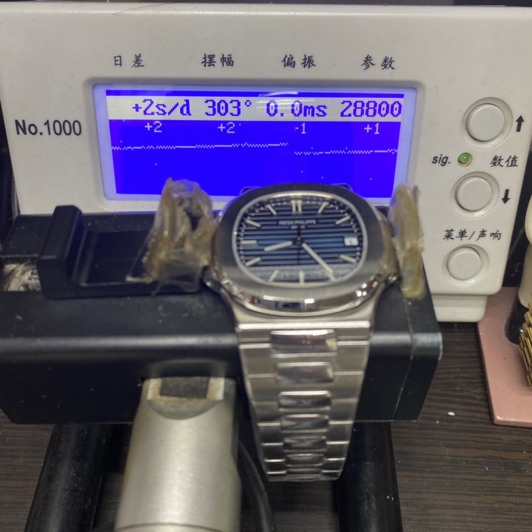 Patek Philippe Nautilus series 58111G-001, White Case with Blue Dial, 40mm Size.