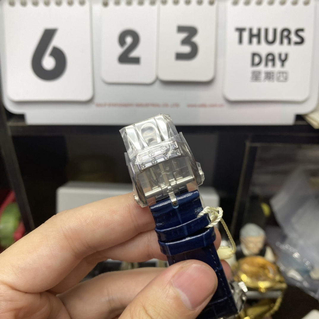 Patek Philippe Nautilus series 5724G-001, Square Diamond Bezel Blue Dial Blue Leather Strap, 40mm size.