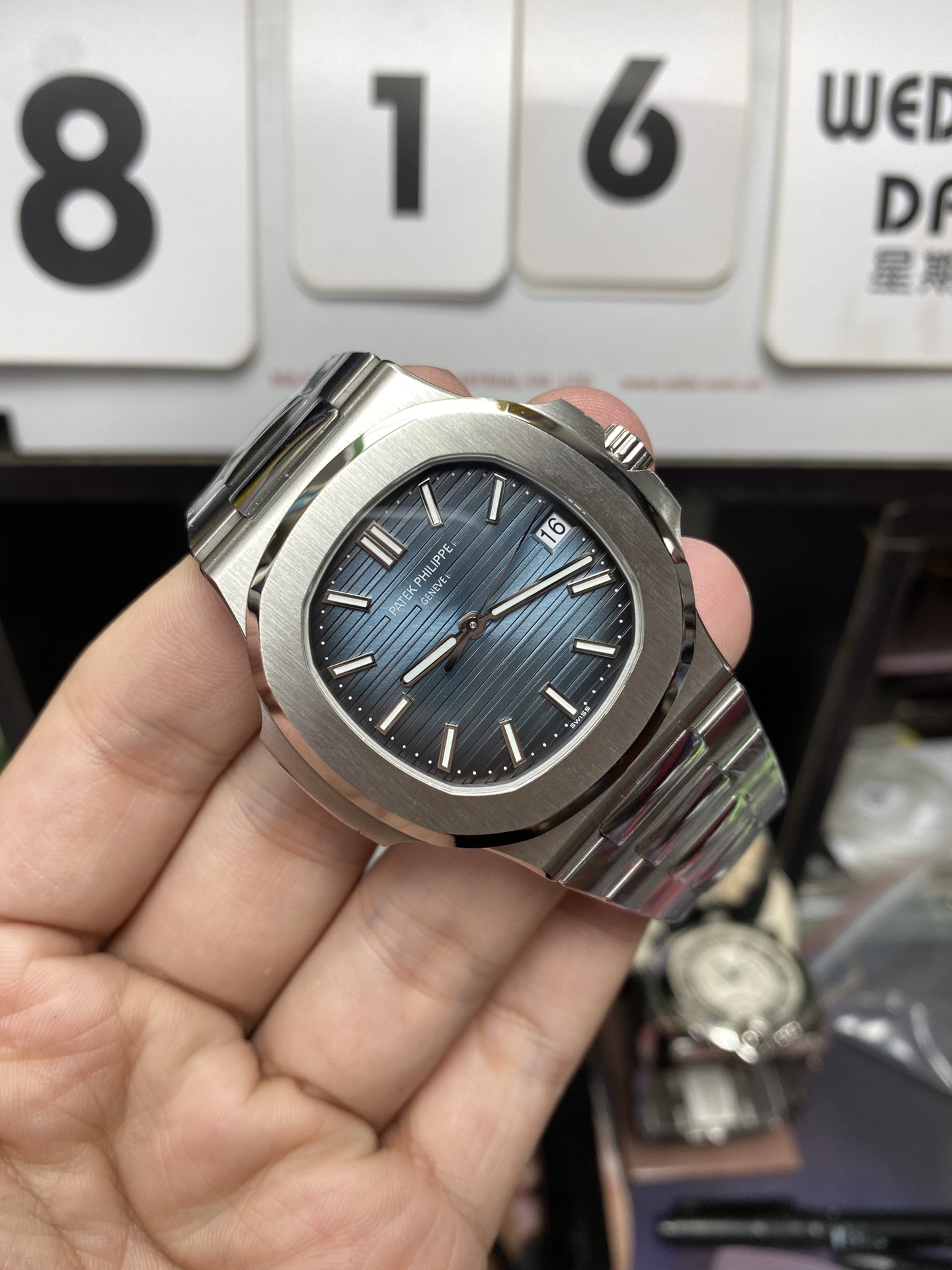 Patek Philippe Nautilus series 57111A 010, Stainless Steel Case Grey-Blue Dial Stainless Steel Bracelet, 40mm Size.