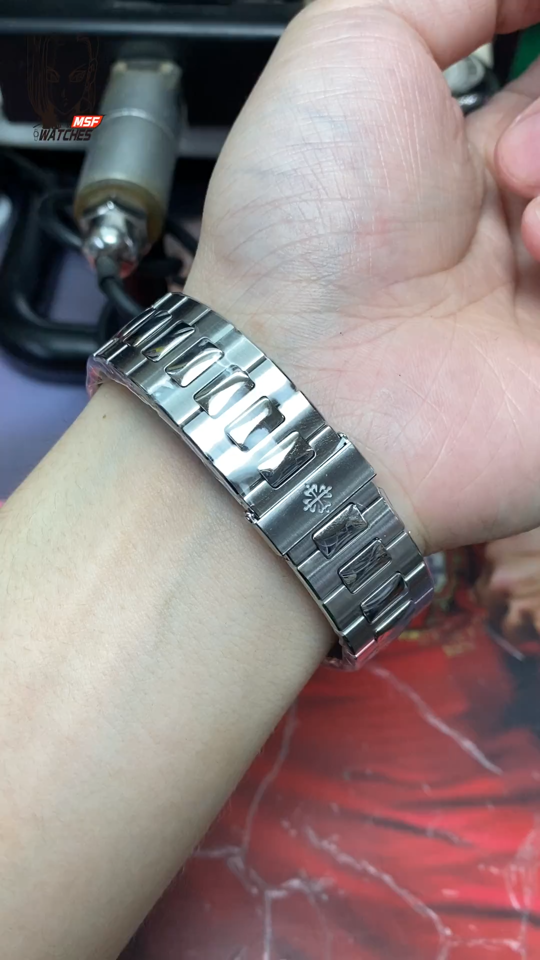 Patek Philippe Nautilus series 57111A-011, White Dial, 40mm Size.