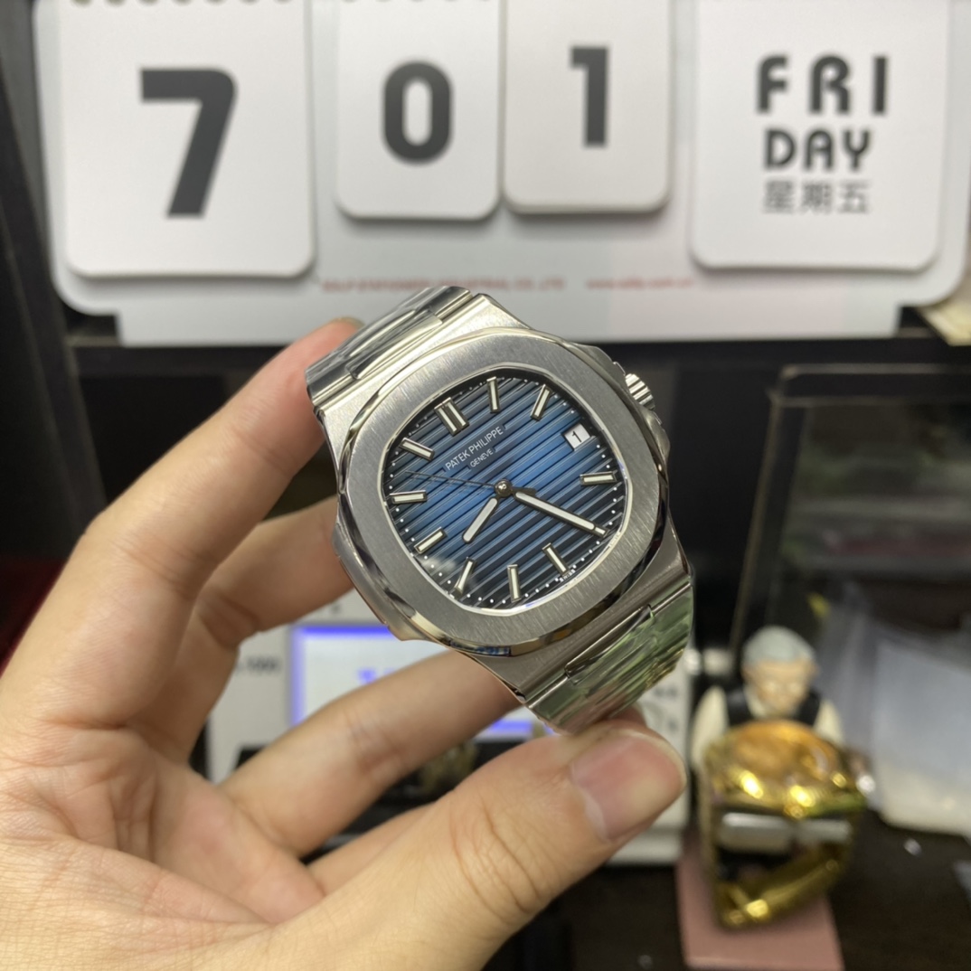 Patek Philippe Nautilus series 58111G-001, White Case with Blue Dial, 40mm Size.