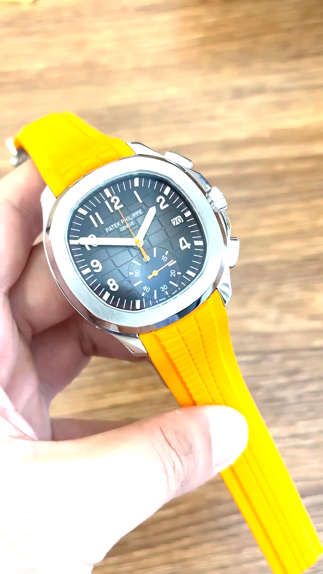 Patek Philippe Aquanaut Series 5968A-001, Brown Dial Dial, 42.2mm size.