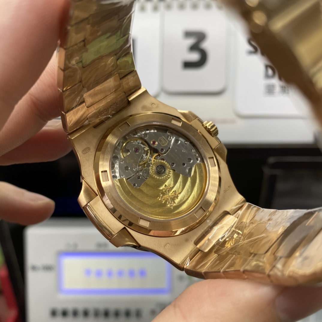 Patek Philippe Nautilus series 57111R-001, Rose Gold Case with Gradient Dark Brown Dial Steel Bracelet, 40mm Size.