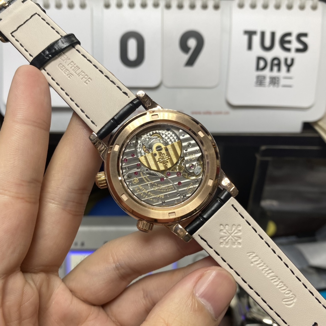 Patek Philippe Complicated Series 6102R-001, Black Dial Gold Case, 44mm Size.