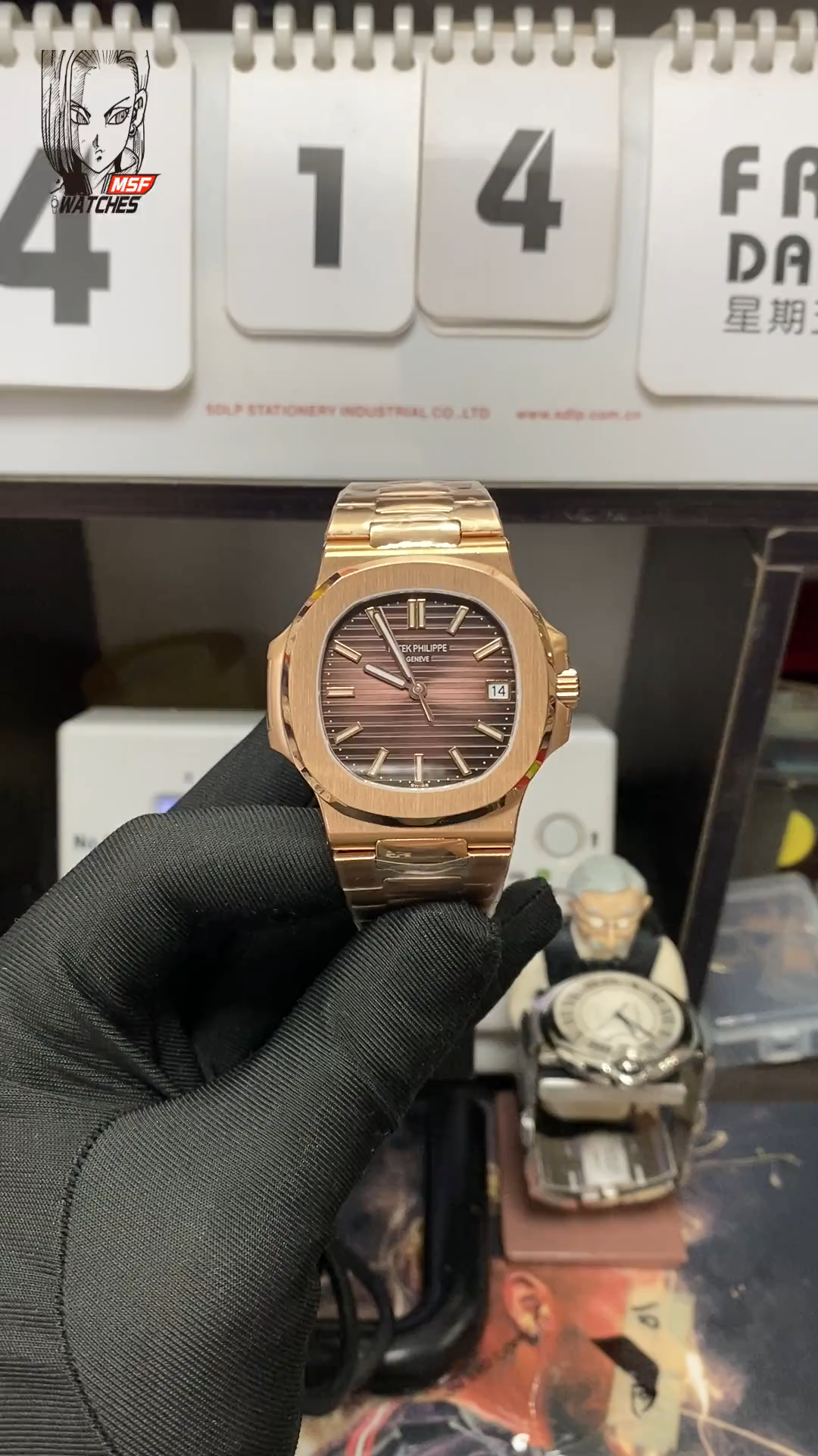 Patek Philippe Nautilus series 57111R-001, Coffee Dial Rose Gold Case Steel Bracelet, 40mm size.