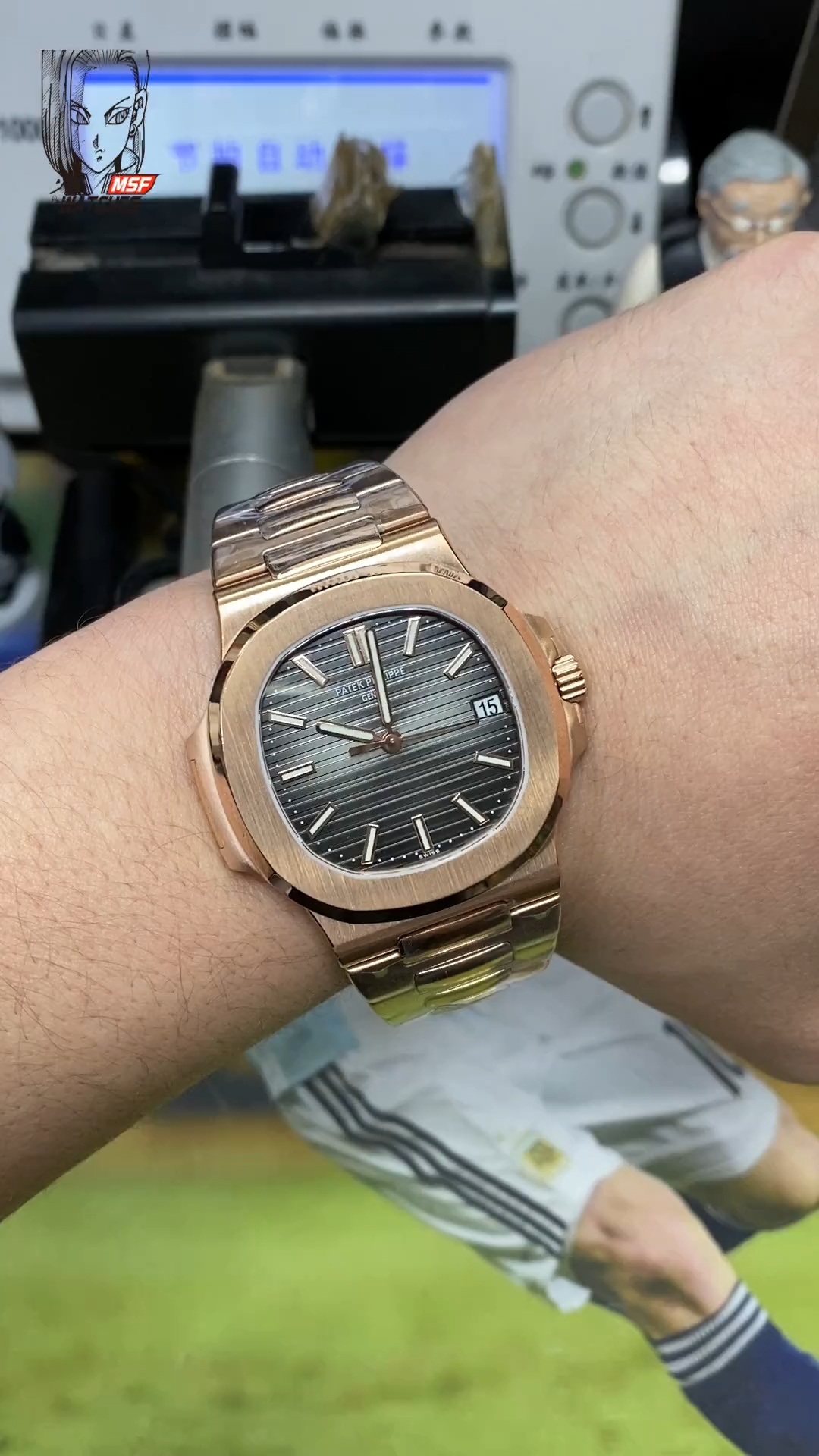 Patek Philippe Nautilus series 5712GR-001, Coffee Dial Rose Gold Case Brown Leather Strap, 40mm size.