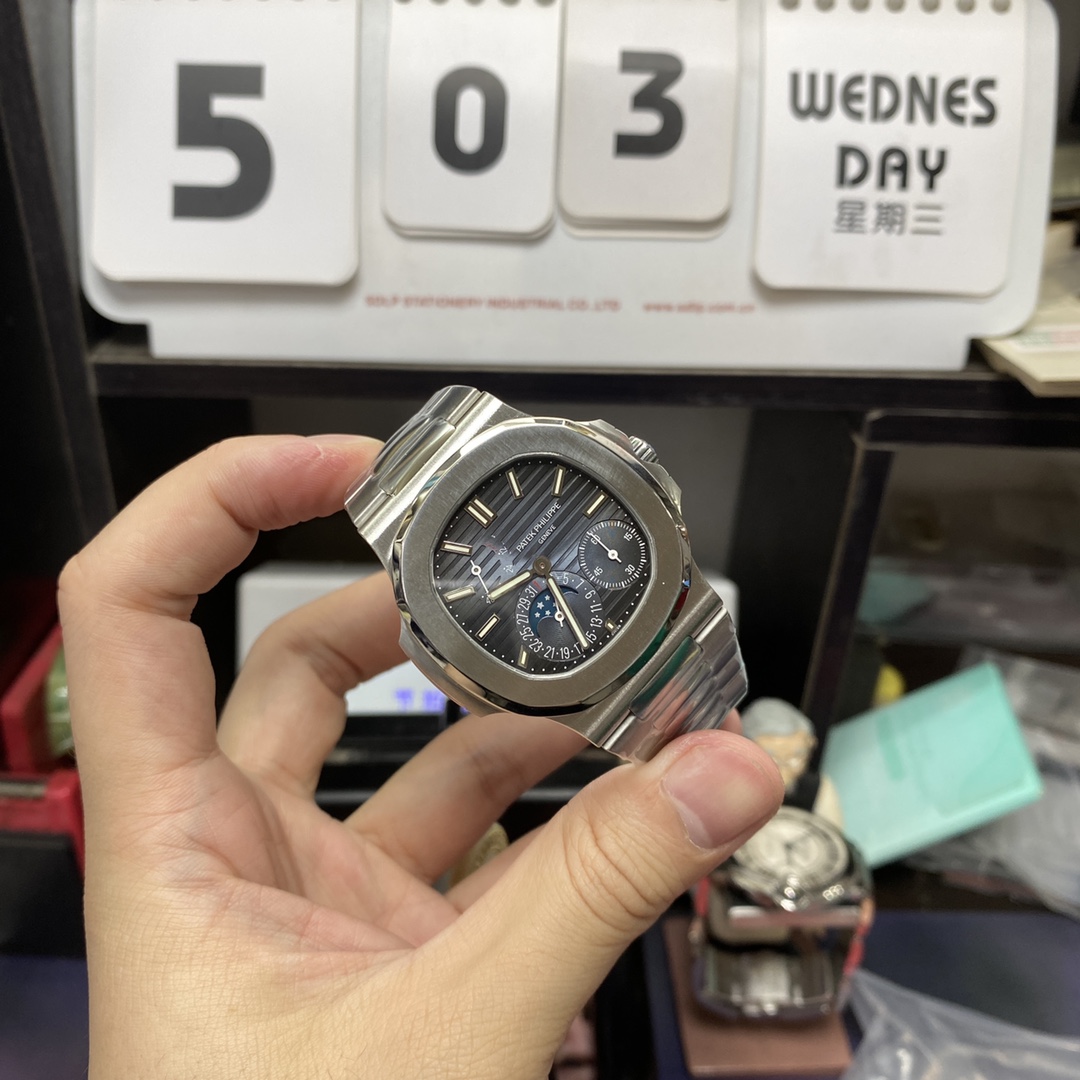 Patek Philippe Nautilus series 57121A-001, Blue Dial Steel Bracelet, Synchronized Functions, 40mm size.