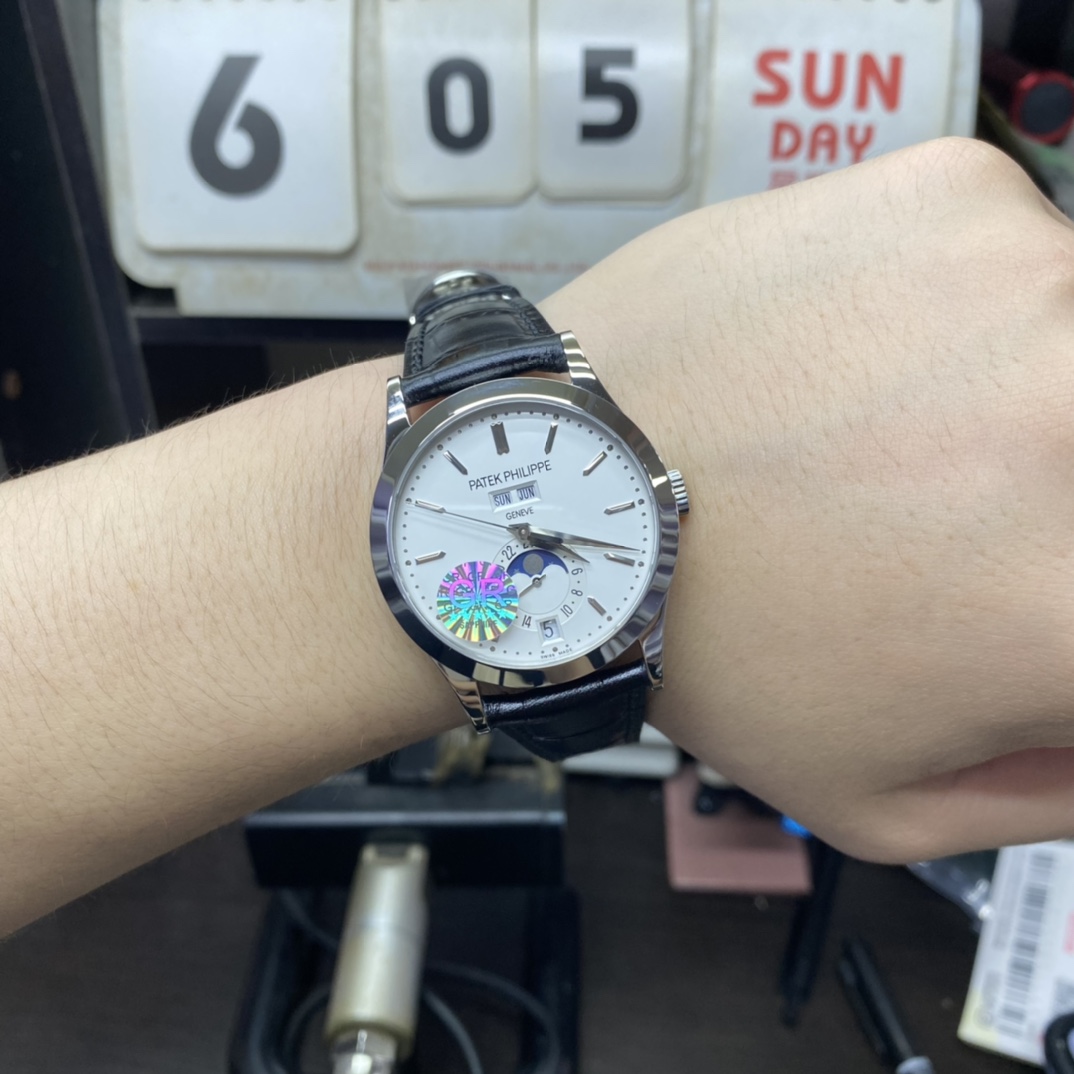 Patek Philippe Complicated Chronograph Series 5396G-011, white dial, Day Month Date and Moon Phase Complications function, 38.5mm Size.