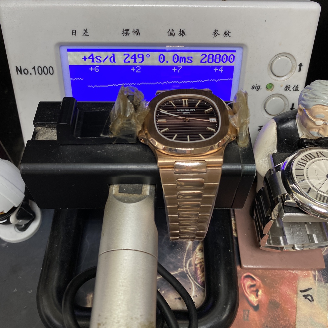 Patek Philippe Nautilus series 57111R-001, Coffee Dial Rose Gold Case Steel Bracelet, 40mm size.