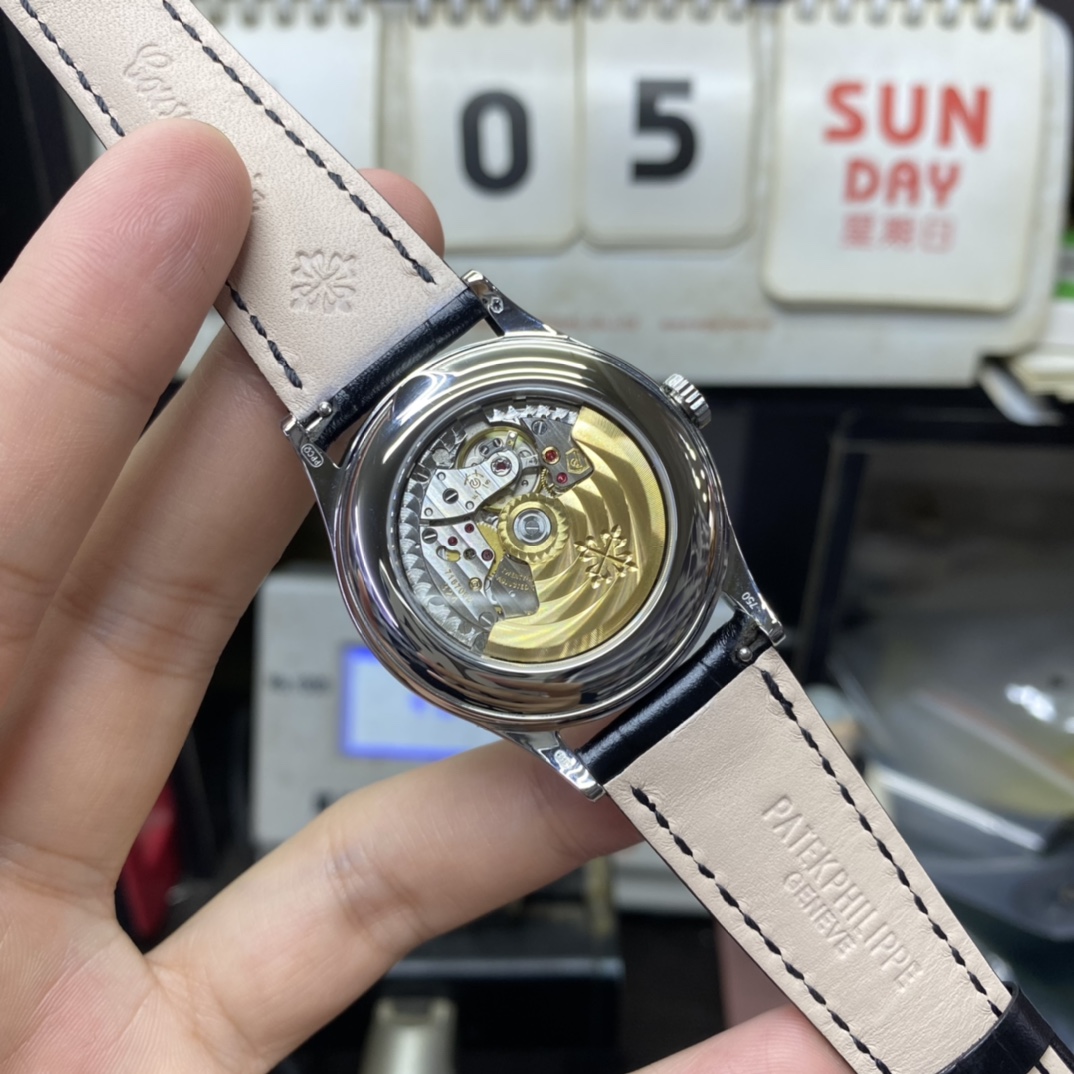 Patek Philippe Complicated Chronograph Series 5396G-011, white dial, Day Month Date and Moon Phase Complications function, 38.5mm Size.