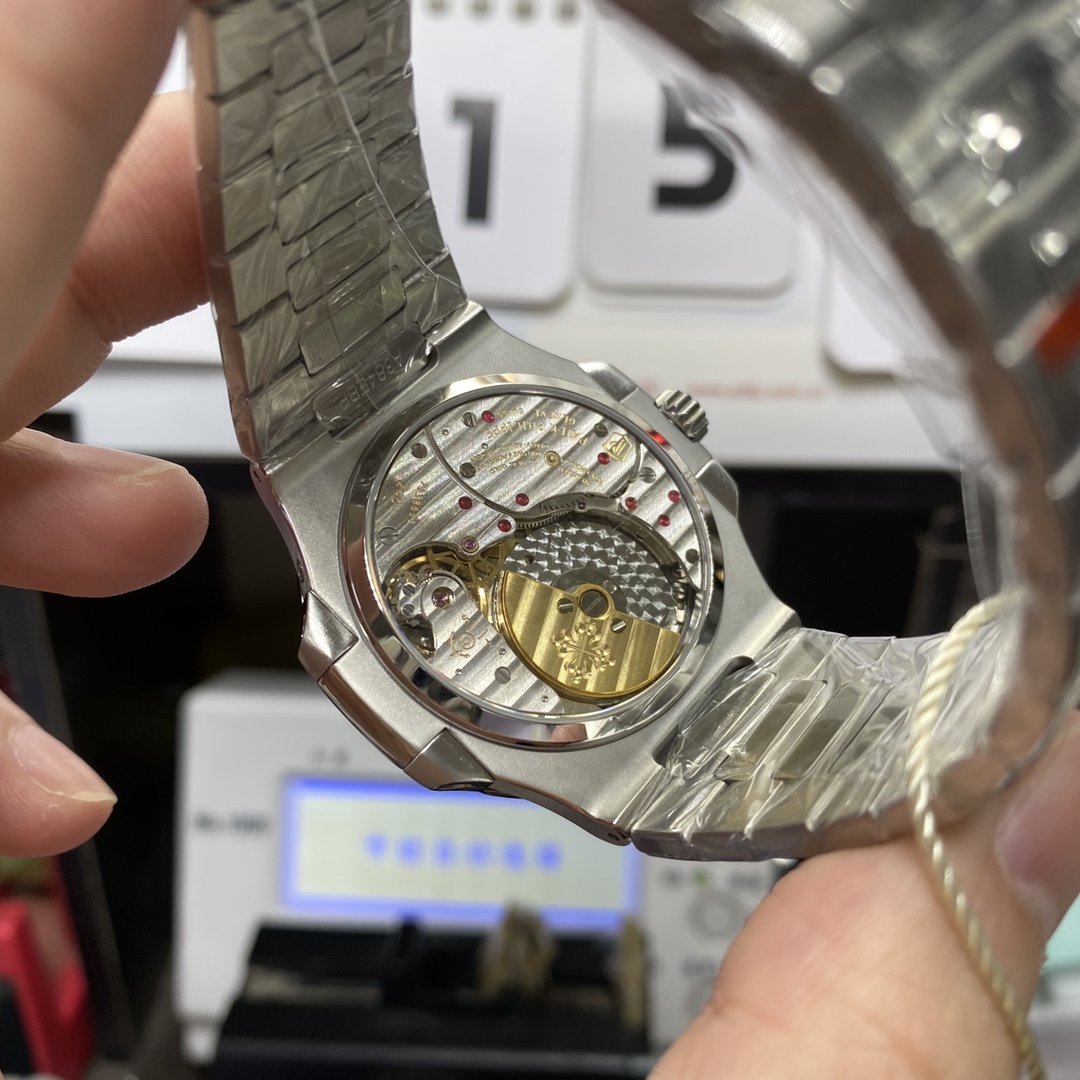 Patek Philippe Nautilus series 57121A-001, Blue Dial Steel Bracelet, Synchronized Functions, 40mm size.