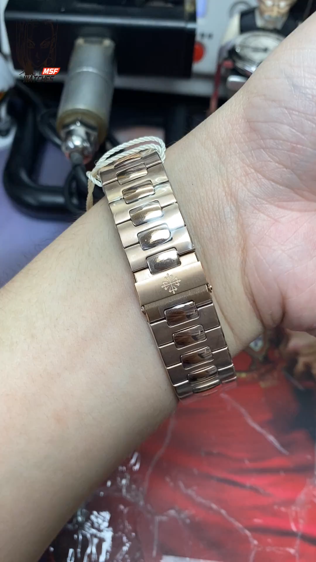 Patek Philippe Nautilus series 57131G-010, Rose Gold with Coffee Dial and Square Diamond Bezel, 40mm Size.