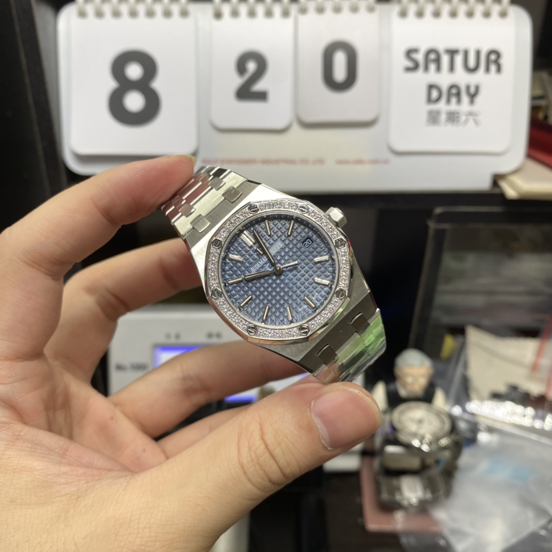 Audemars Piguet Royal Oak Offshore Series 77451ST.ZZ.1361ST.04, Blue Dial Gem-Set Bezel Mechanical Movement, 34mm Size.