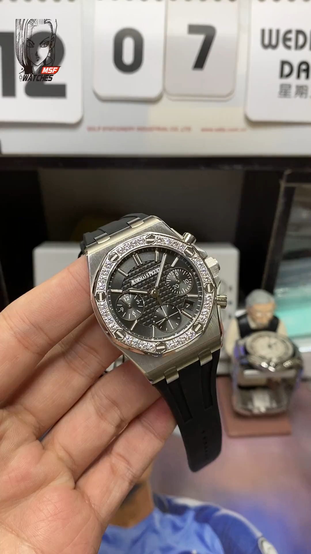 Audemars Piguet Royal Oak Offshore Series 26231ST.ZZ.D002CA.01, Women's Chronograph Black Dial with Diamond Bezel, 37mm size.