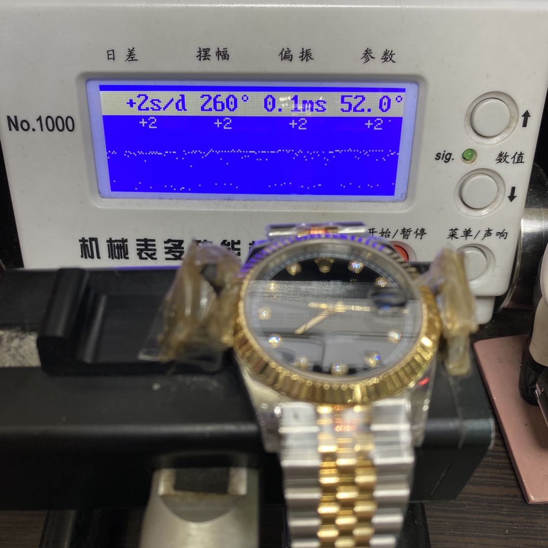 Rolex Datejust series m126333-0006, two-tone gold case black dial with diamond markers and a five-link two-tone gold bracelet, 41mm size.