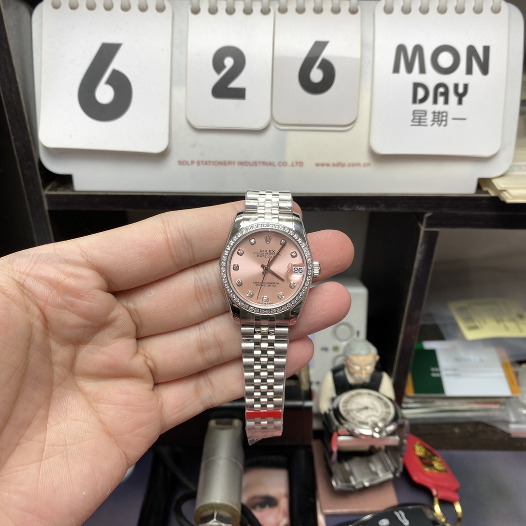 Rolex Datejust series m278384rbr-0036, Pink Dial with Diamond Bezel, 31mm size, Jubilee stainless steel bracelet.