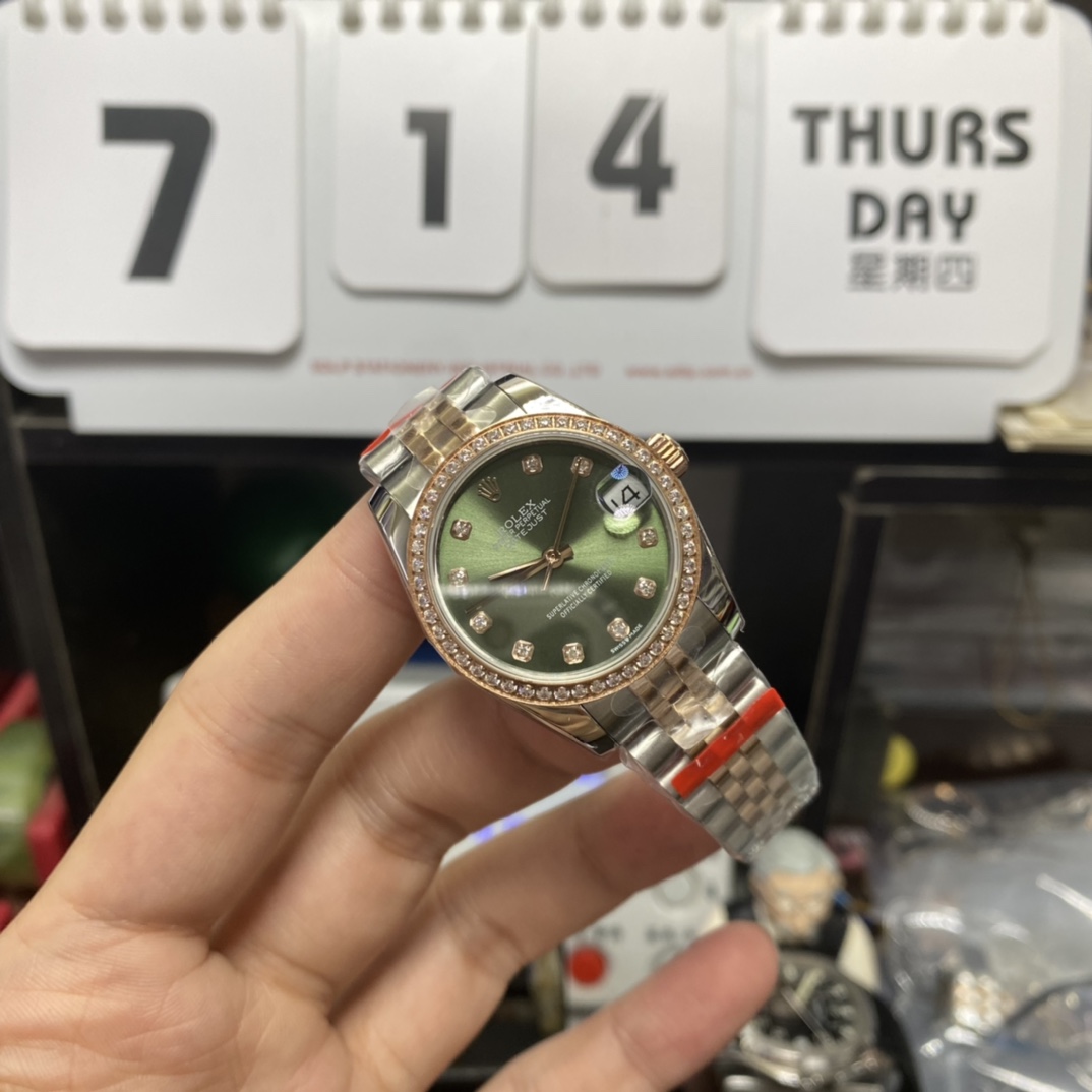 Rolex Datejust series m278383rbr-0030, Two-Tone Gold Case with Green Dial and Diamond Bezel, 31mm size, Jubilee bracelet.