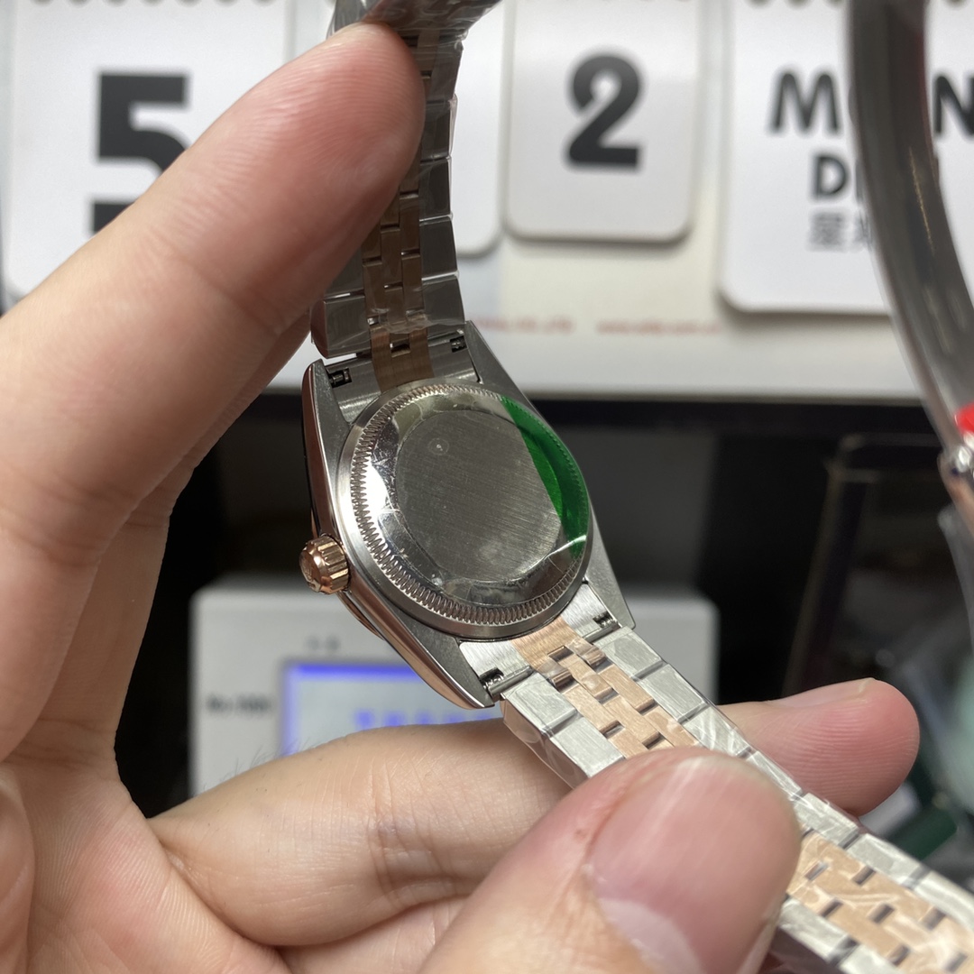 Rolex Datejust series m278383rbr-0030, Two-Tone Gold Case with Green Dial and Diamond Bezel, 31mm size, Jubilee bracelet.