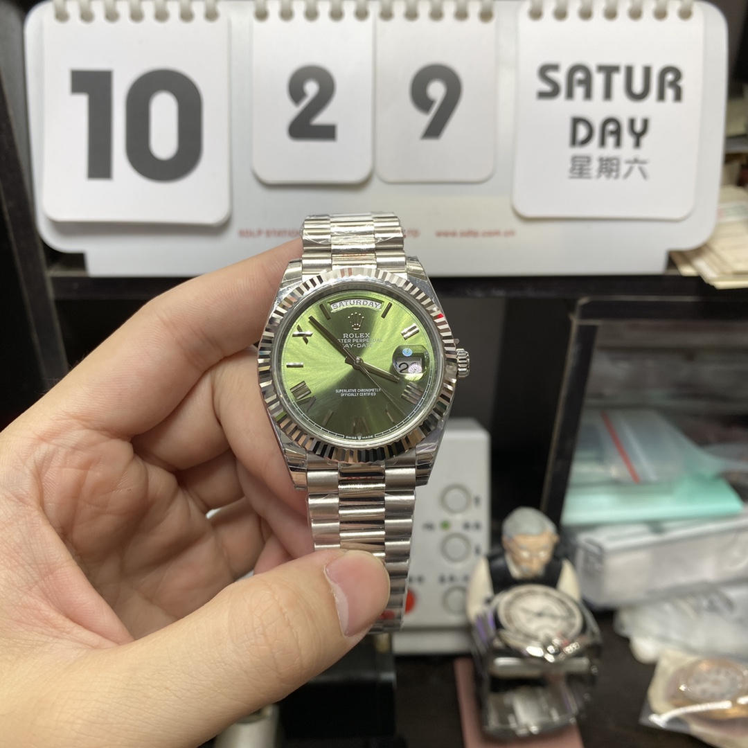 Rolex Day-Date series m228239-0033, Silver Case Olive Green Dial with Roman Numeral Markers, Instantaneous Day and Date Functions, 40mm Size.