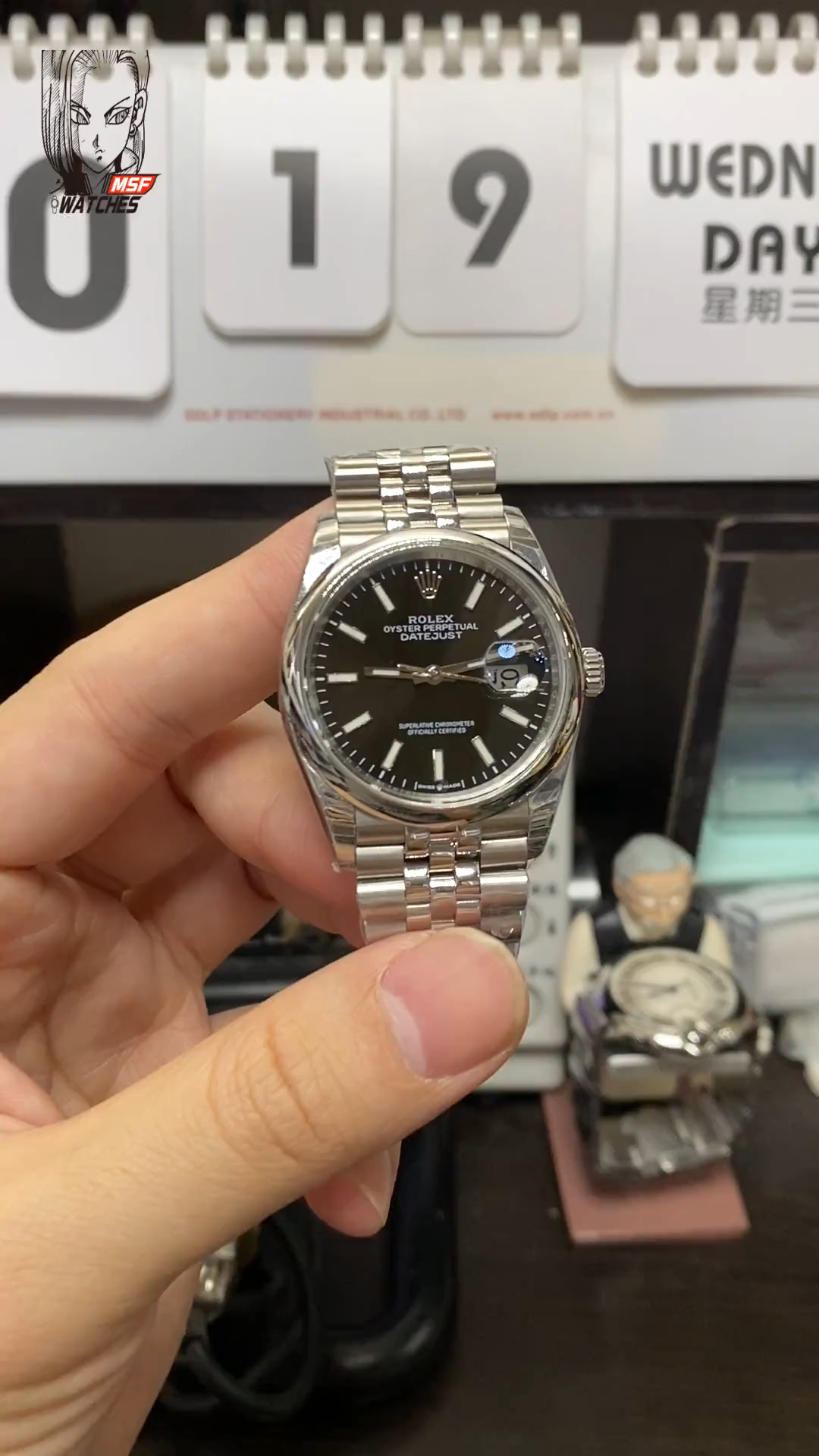 Rolex Datejust Series m126200-0003, Black Dial with Fluted Bezel and Five-link Bracelet, 36mm Size.