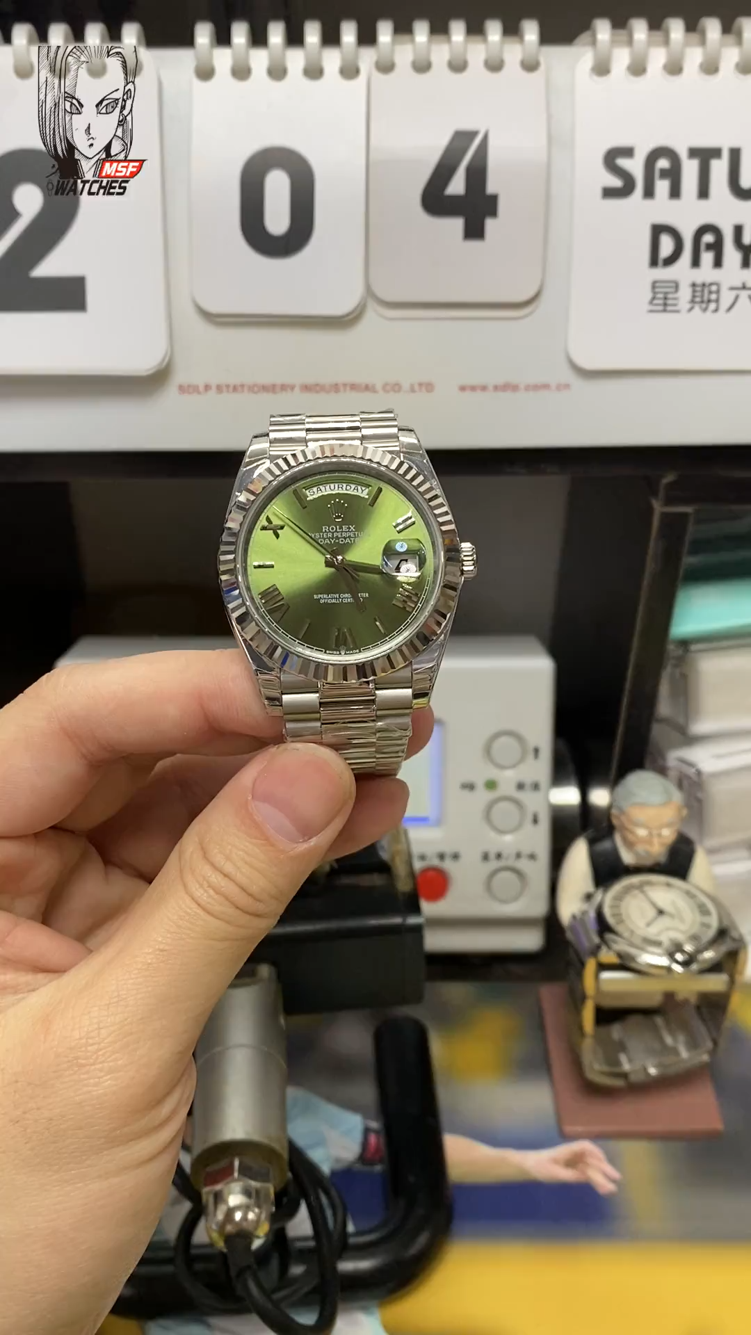 Rolex Day-Date series m228239-0033, Silver Case Olive Green Dial with Roman Numeral Markers, Instantaneous Day and Date Functions, 40mm Size.