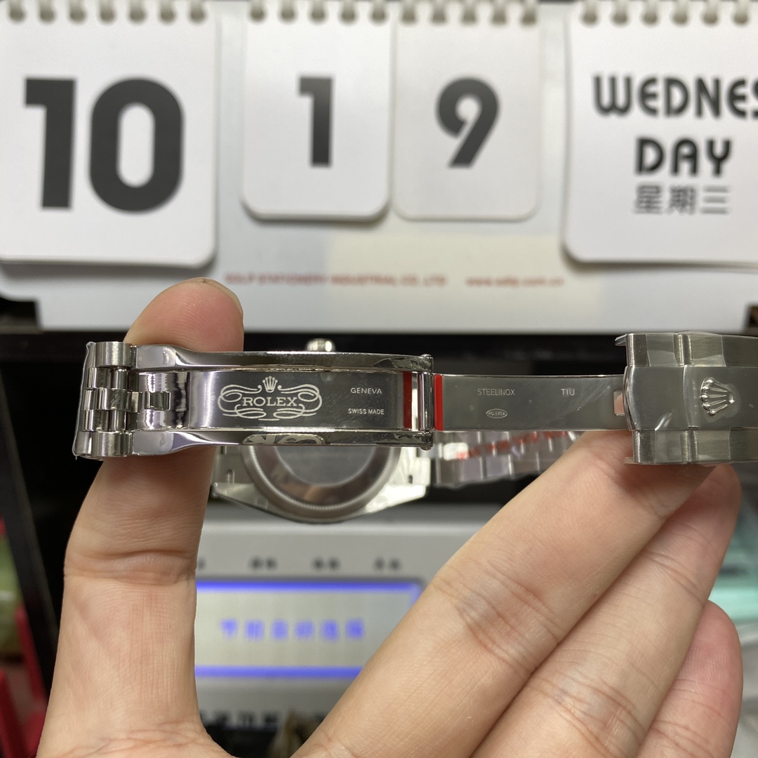 Rolex Datejust Series m126200-0003, Black Dial with Fluted Bezel and Five-link Bracelet, 36mm Size.