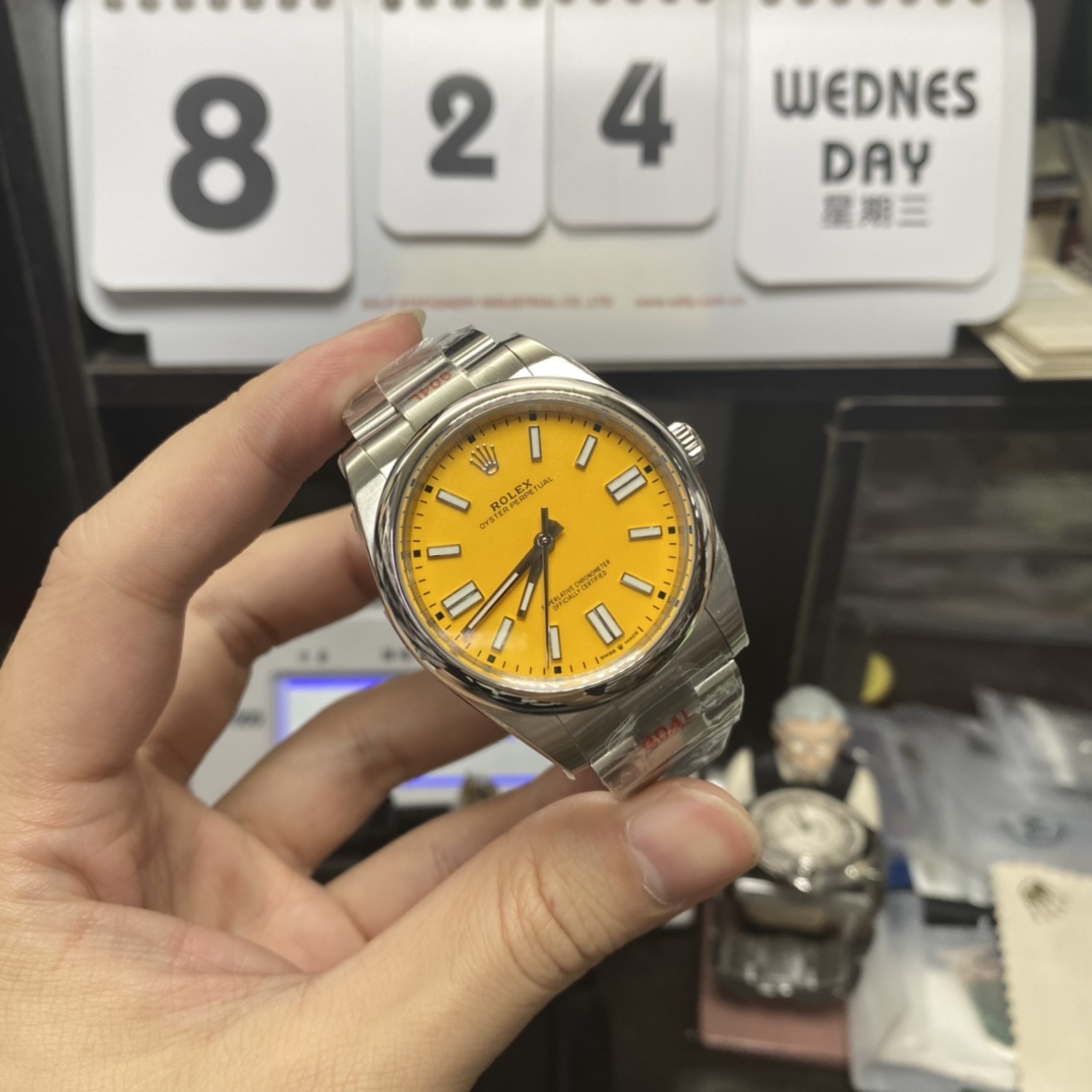 Rolex Oyster Perpetual Series m124300-0004, Yellow Dial, 41mm size.