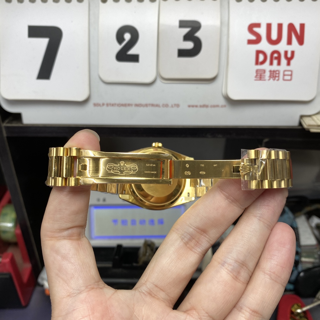 Rolex Day-Date series m128238-0069, Full Gold with Green Dial Diamond Hour Markers, 36mm Size.