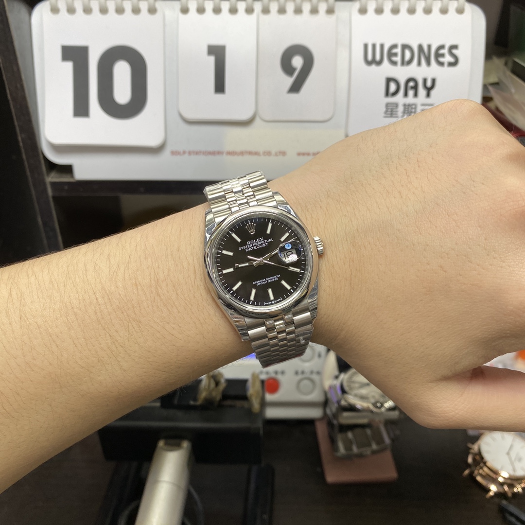 Rolex Datejust Series m126200-0003, Black Dial with Fluted Bezel and Five-link Bracelet, 36mm Size.