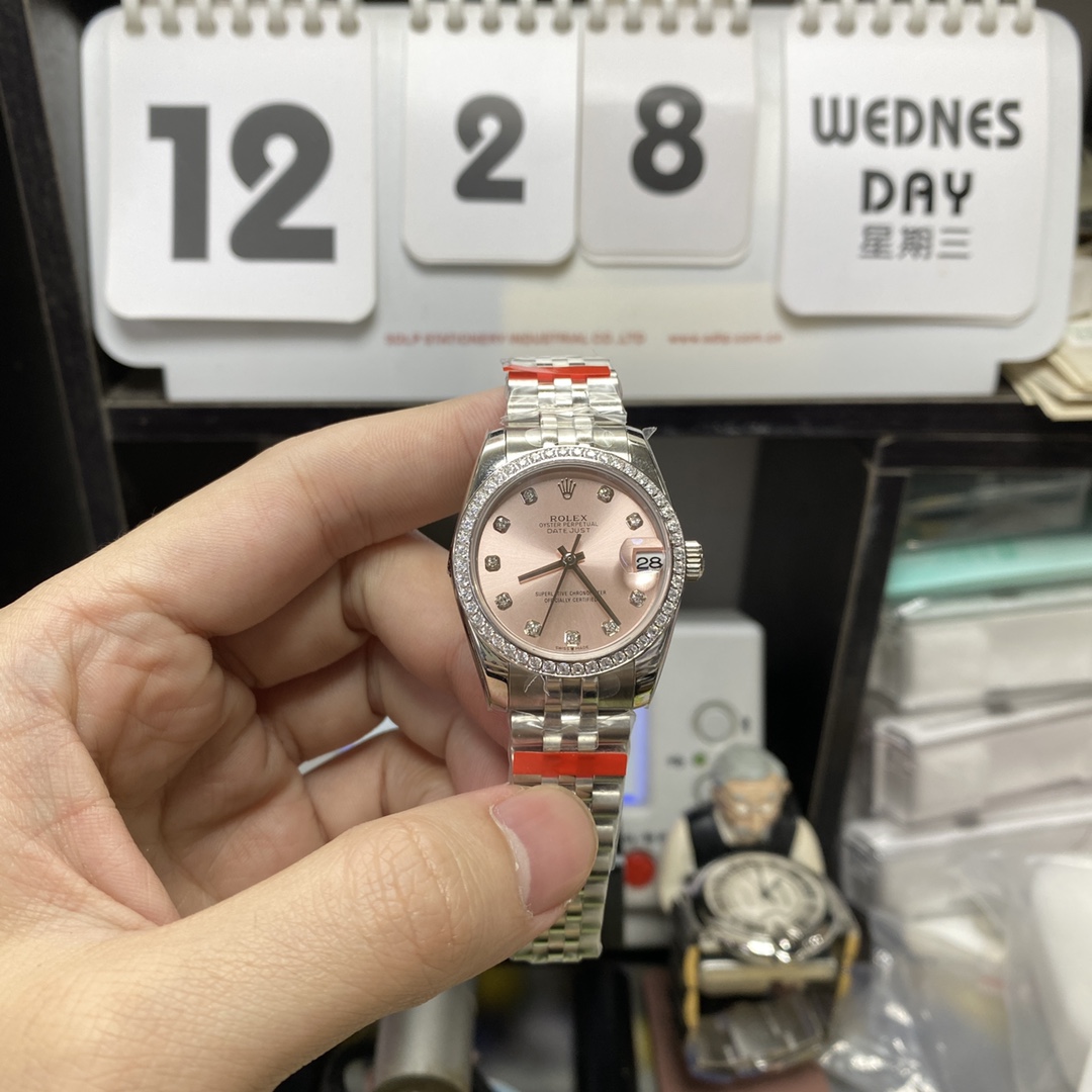 Rolex Datejust series m278384rbr-0036, Pink Dial with Diamond Bezel, 31mm size, Jubilee stainless steel bracelet.
