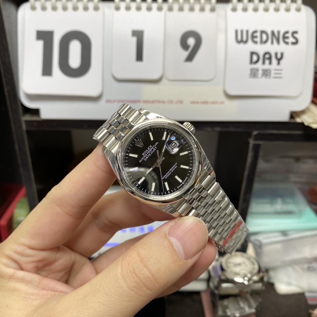 Rolex Datejust Series m126200-0003, Black Dial with Fluted Bezel and Five-link Bracelet, 36mm Size.