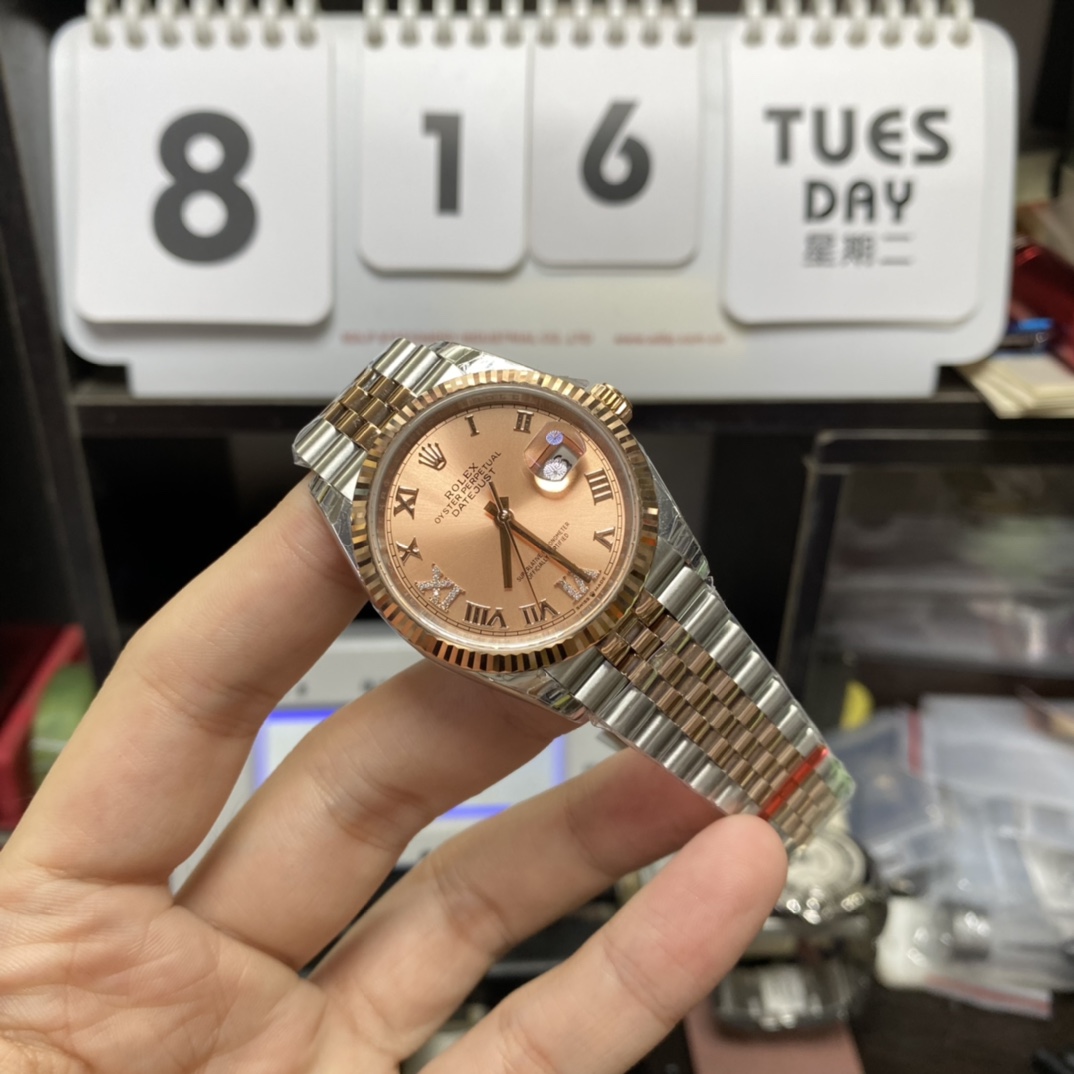 Rolex Datejust Series m126231-0027, Rose Red Dial Everose Gold Case Roman Numerals Five-Piece Link Jubilee Bracelet, 36mm Size.