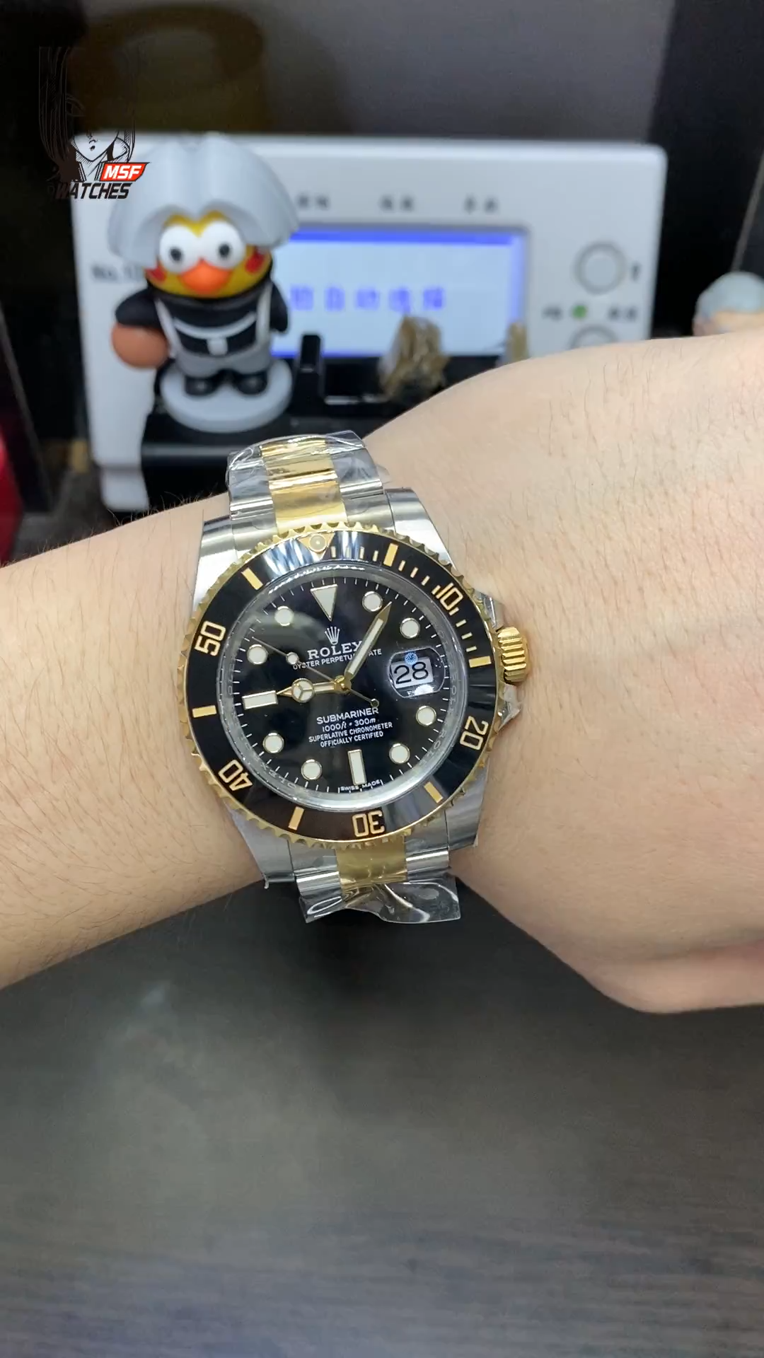 Rolex Submariner Series 116613LN-0001, Two-Tone Black Submariner, 40mm size.